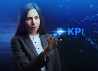 The concept of business, technology, the Internet and the network. A young entrepreneur working on a virtual screen of the future and sees the inscription: KPI