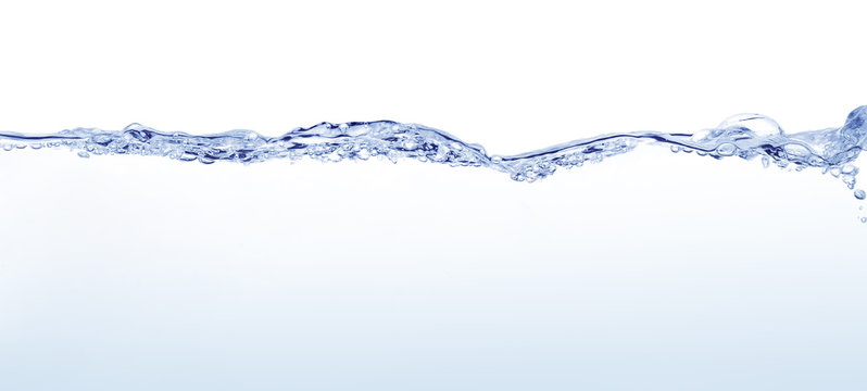Long line of water surface with soft undulations against white background