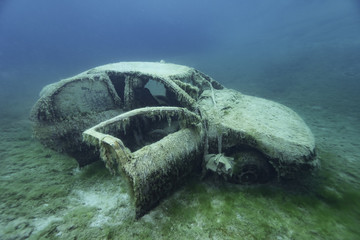 Car wreck under water in a lake, Germany