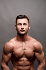 Athletic Man Fitness Model Torso showing big muscles.