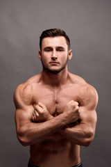 Athletic Man Fitness Model Torso showing big muscles.