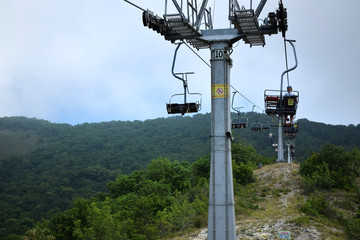Gelendzhik, Russia - June 27, 2018: Cableway in Safari park leading to the top of the Markotkh ridge