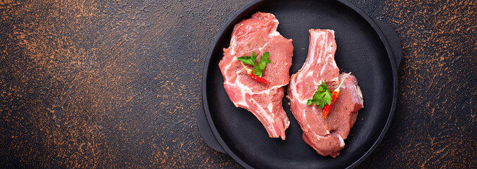 Raw meat  in cast iron pan