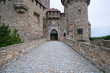 Stone bridge in medieval Kreuzenstein castle in Leobendorf village near Vienna, Austria