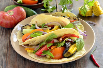 Vegetarian tortilla tacos with grilled vegetables and corn