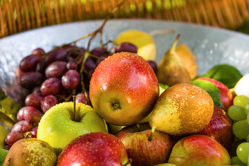 Fruit in a bowl - apples, pears and grapes