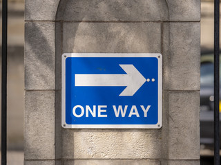 One Way sign with arrow
