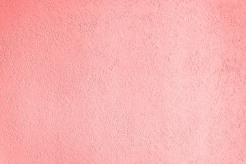 texture of the surface of the wall covered with decorative plaster of the woodworm type