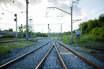 Fototapeta na wymiar rails stretching into the distance, railroad tracks, turn at the railroad. junction of railway tracks