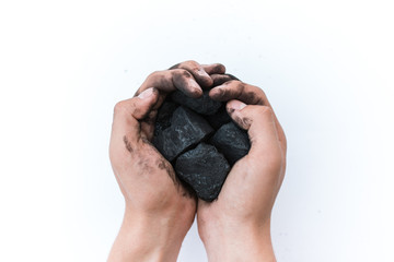 Coal mining: coal miner in hands. The idea of the picture is to extract a mineral or energy source...