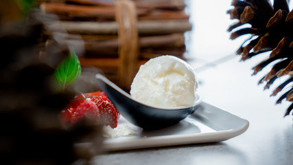 Ice cream with strawberries, mousse dessert served at restaurant
