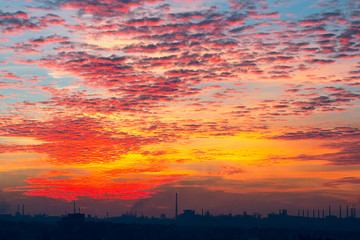 Sunset over an industrial city