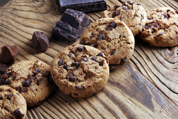 Chocolate cookies on table. Chocolate chip cookies shot with chocolate