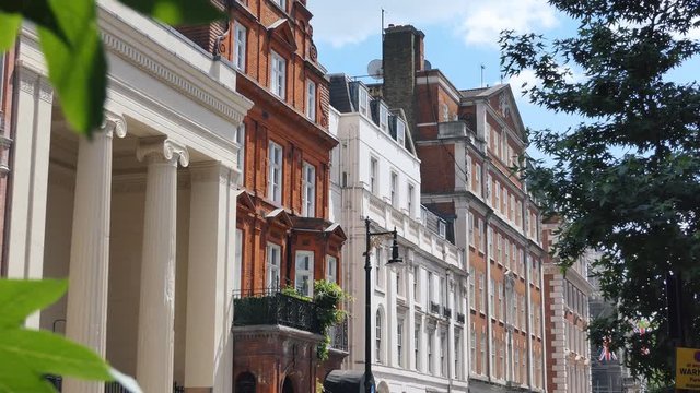 London. A building with columns and typical apartment houses.