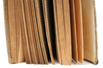 Book pages close-up on a white background. Front view.