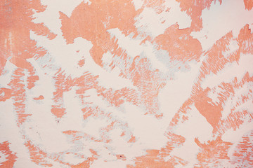 The texture of the plaster, as in unfinished repairs.