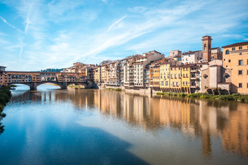 View of medieval stone bridge Ponte Vecchio and the Arno River in Florence, Tuscany, Italy