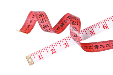 Two red measuring tapes spiral on white background. The tailor's meter isolated.