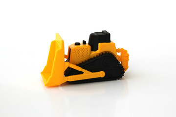 Fototapeta premium A Toy bulldozer on an isolated white background 2