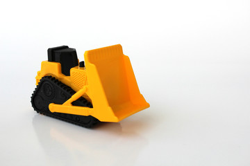 Fototapeta premium A Toy bulldozer on an isolated white background 6