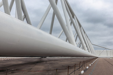 Naklejka premium Detail steel construction Dutch storm surge barrier Maeslantkering near Hoek van Holland protecting the harbor of Rotterdam