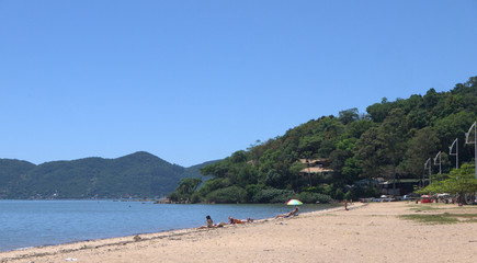 Fototapeta na wymiar The quiet sandy beaches of Praia de Fora Palhoça Santa Catarina Brasil..