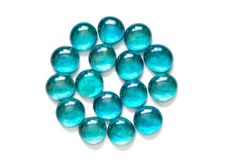 A circle of glass stones turquoise color