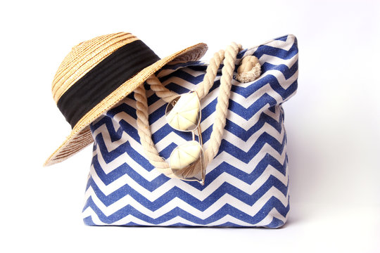 Beach Bag And Hat Isolated On White