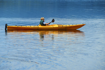  Active happy child. Teenage school boy having fun enjoying adventurous experience kayaking on the...