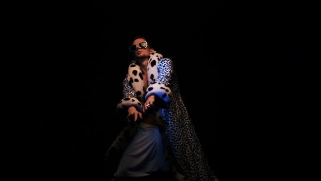 Glamorous guy dancing