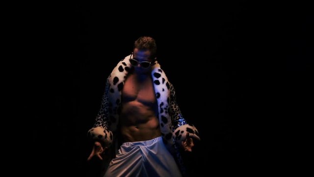 Glamorous guy dancing