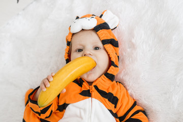 baby wearing tiger suit