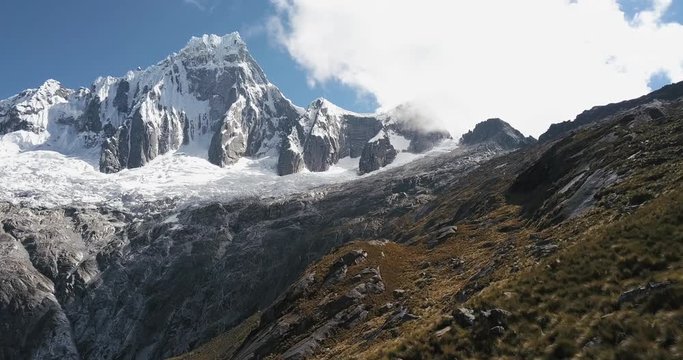 An aerial view of a 6000m mountain in the peruvian andes.
