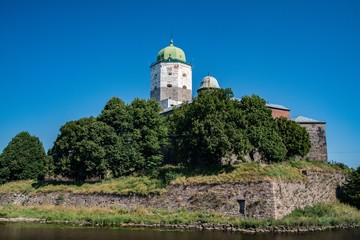 Fototapeta na wymiar View of a tower of the lock of the city of Vyborg.