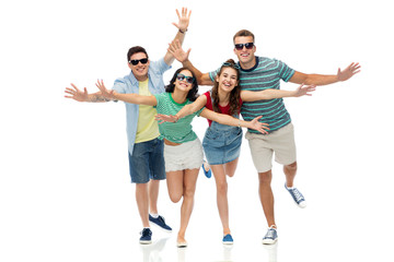 friendship, summer and people concept - group of happy smiling friends in sunglasses having fun over white background