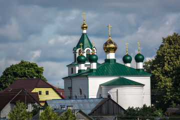 Fototapeta na wymiar Church with golden domes.