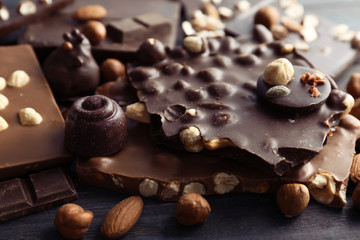 Obraz na płótnie Canvas Different delicious chocolate bars and candies, closeup