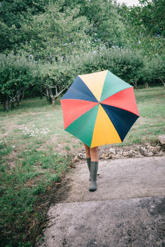 Campagne, parapluie et bottes