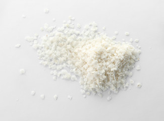 Fototapeta na wymiar Raw rice flakes on white background. Healthy grains and cereals