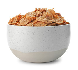 Bowl with wheat flakes on white background. Healthy grains and cereals