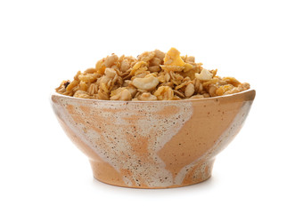 Bowl with wheat flakes on white background. Healthy grains and cereals