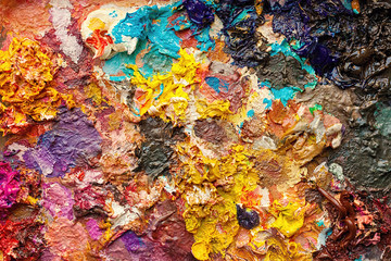 Mixed colors of oil paint on a palette