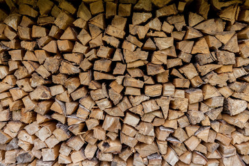 woodpile, wall of evenly laid firewood