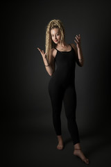 Blonde young woman dancing dancehall