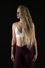 Fototapeta premium Blonde young woman dancing dancehall