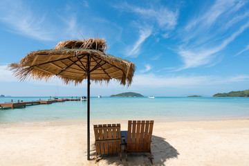 Beach Chairs and Umbrella on summer island in Phuket, Thailand. Summer, Travel, Vacation and Holiday concept.