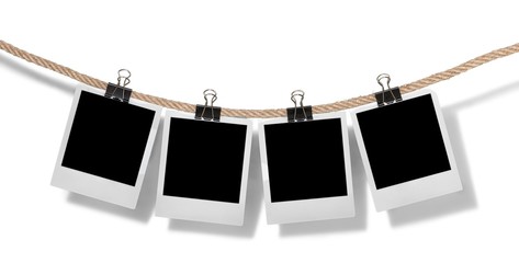 Blank Polaroids Hanging from a Rope