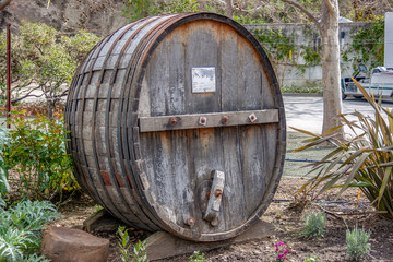 Upended Large Weathered Wooden Wine Barrel