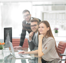 Group business partners discussing new project at meeting in office room