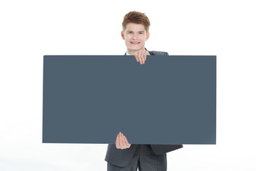 young businessman showing a blank placard.isolated on a white